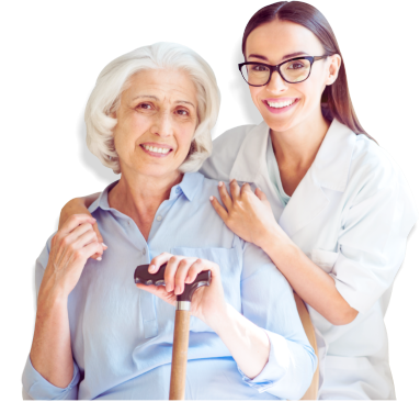 elderly woman and a caregiver smiling
