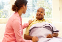 Woman looking after sick father