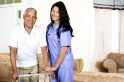 Health Care Worker and Elderly Man
