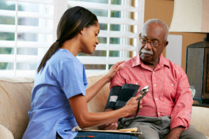 elderly man and a nurse