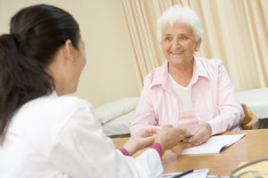 elderly woman in office